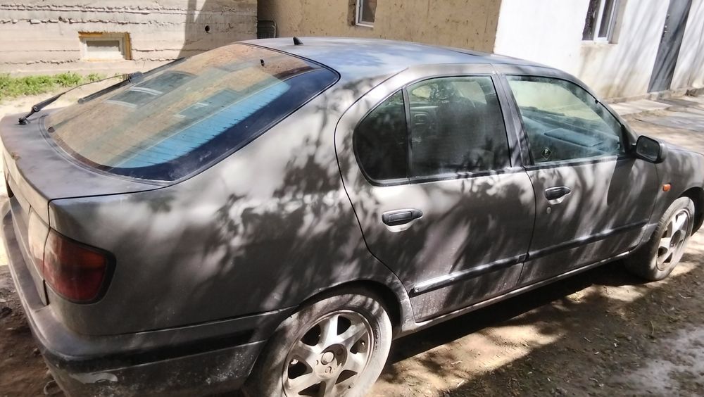 Ниссан Примера P11