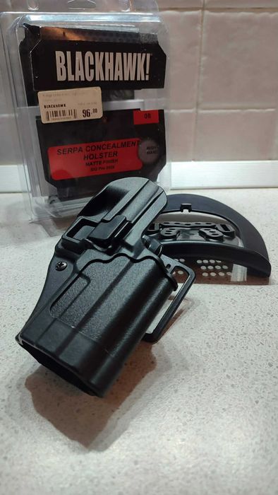 Тактическият кобур Blackhawk Sig Sauer  и Кобур пълнител 9mm BlackHawk