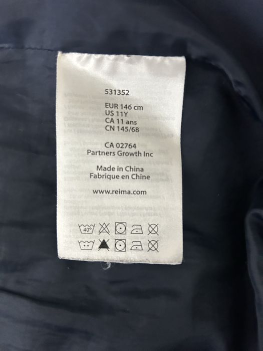 Пуховик для девочки Reima рост 146