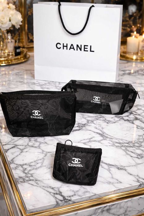 комплект от несесери на марката шанел сет чантички в черен цвят chanel