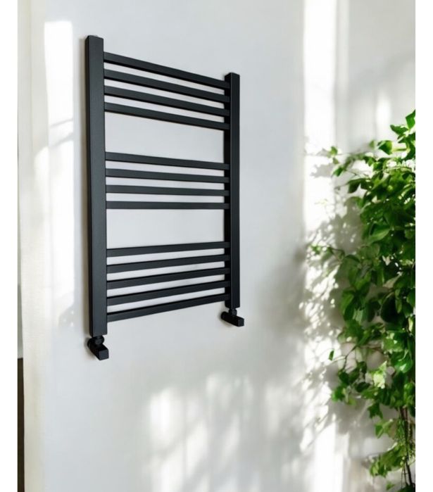 Черный полотенцесушитель новый