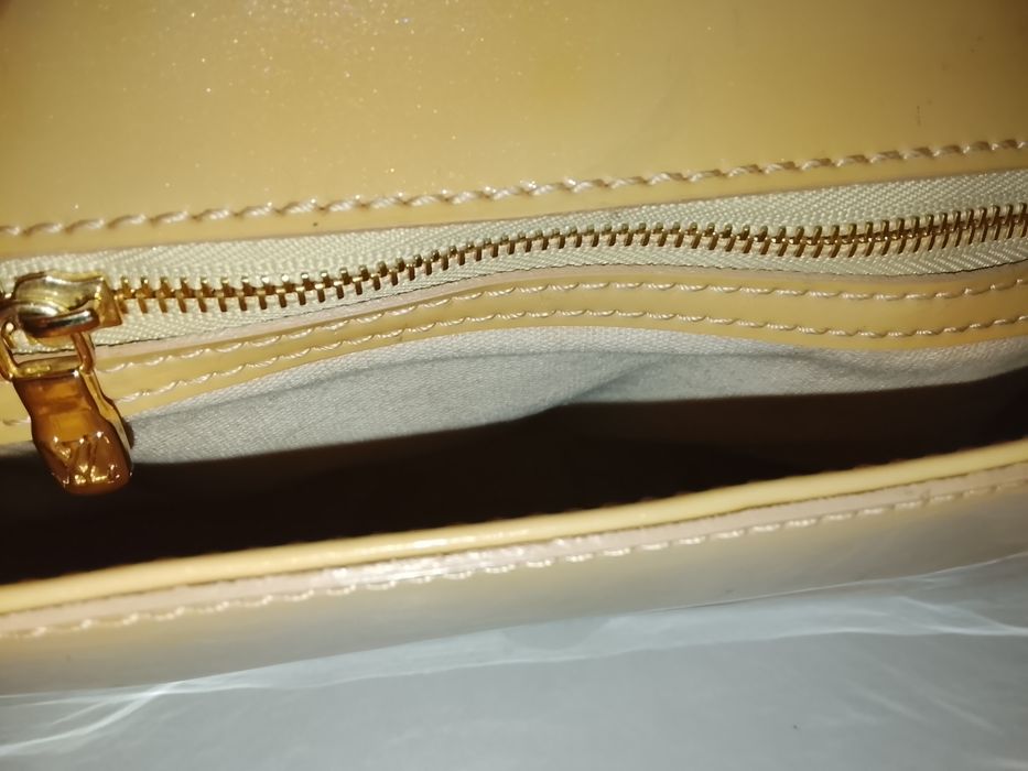 Louis Vuitton Sobe Clutch