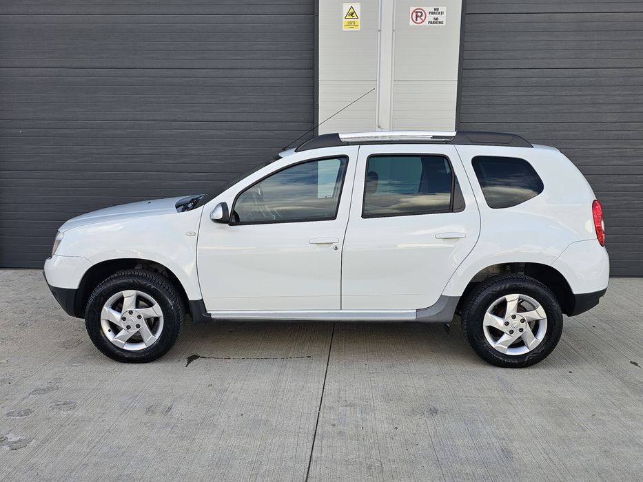 Dacia Duster Prestige 1.6 Benzina 105CP, 4x4 cu blocant AC, Piele  Senzori  Jante  Cârlig  Posibil Rate