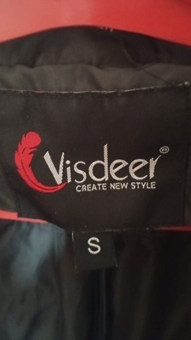 Продам пуховик женский