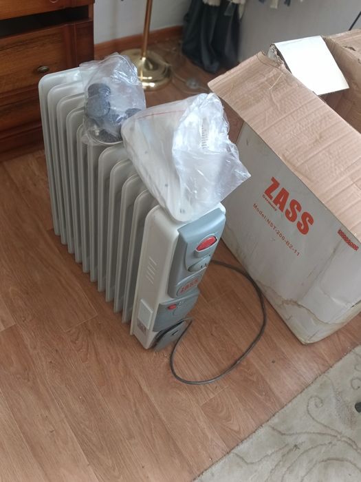 Обогреватель масляный новый