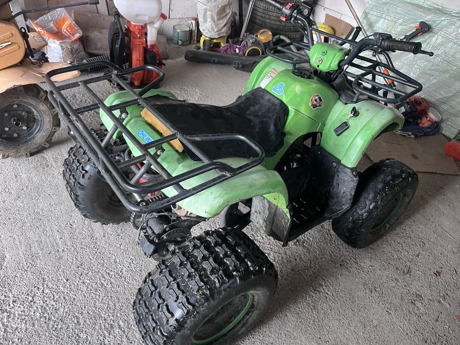 Vind atv 125 kxd sau schimb cu cross