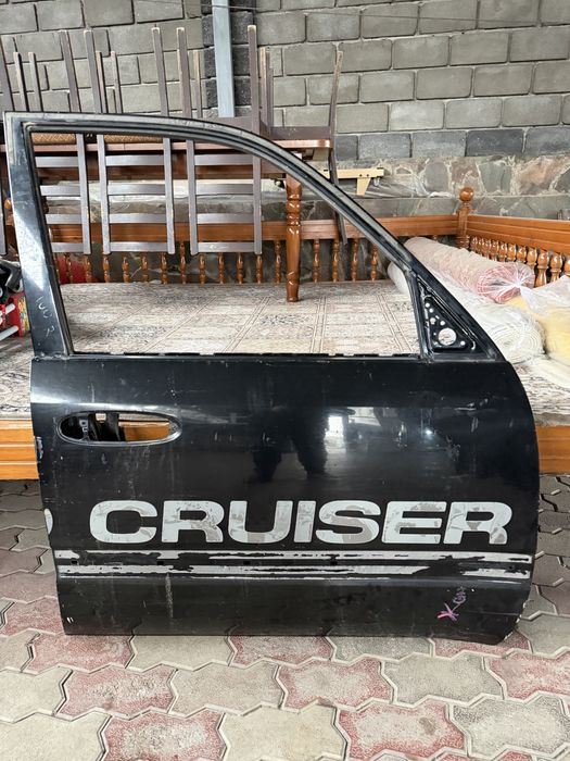 Двери и крыло от крузака 100