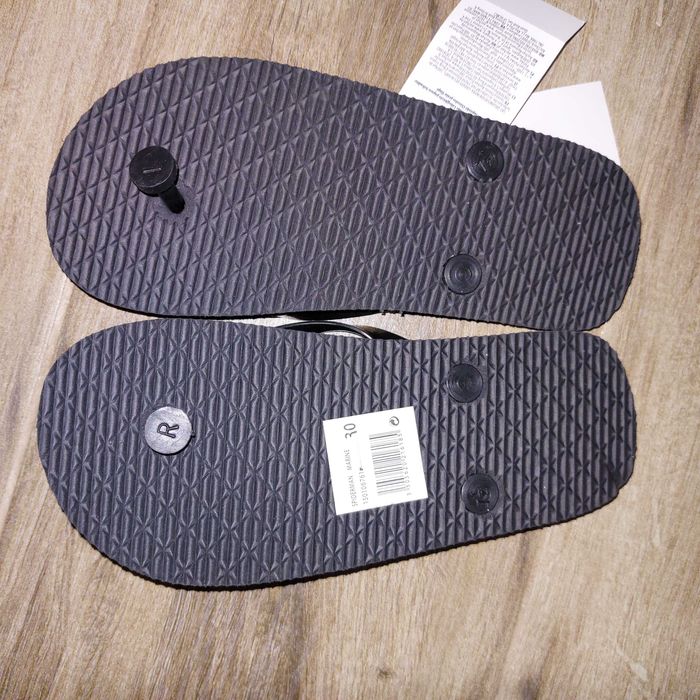 Papuci cu Spiderman, noi cu etichetă