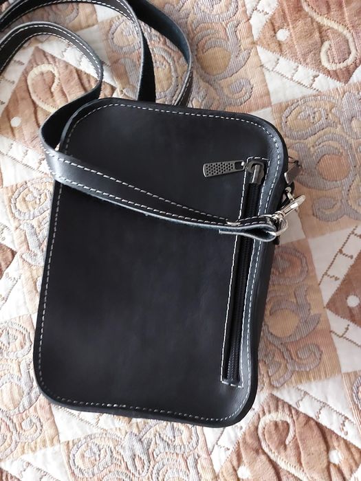 Продам кожанная мужская сумка