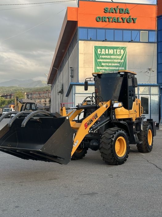 фронтальный колесный погрузчик 948