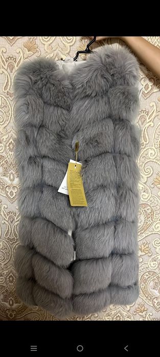 Продам жилет меховой