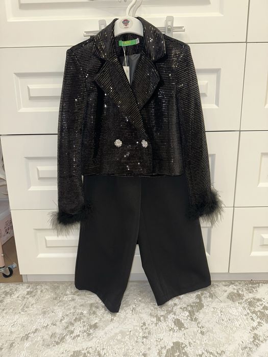 Новй Костюм на 7-8 лет