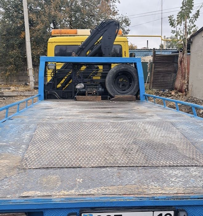 Авто услуги эвакуатор манипулятора.
