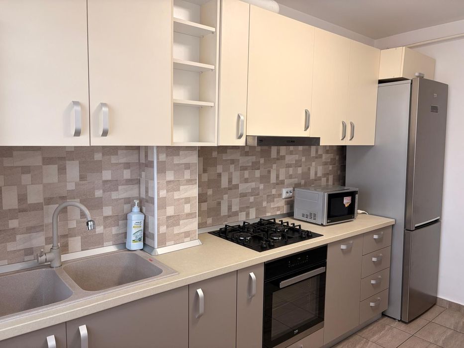 Apartament complet mobilat cu 2 camere și loc de parcare cu CF,