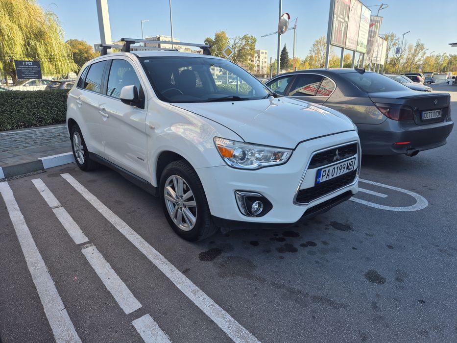 Mitsubishi AXS 2013год.