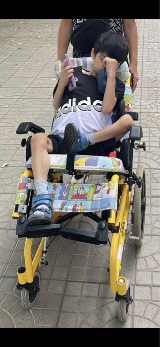 Детская инвалидная коляска