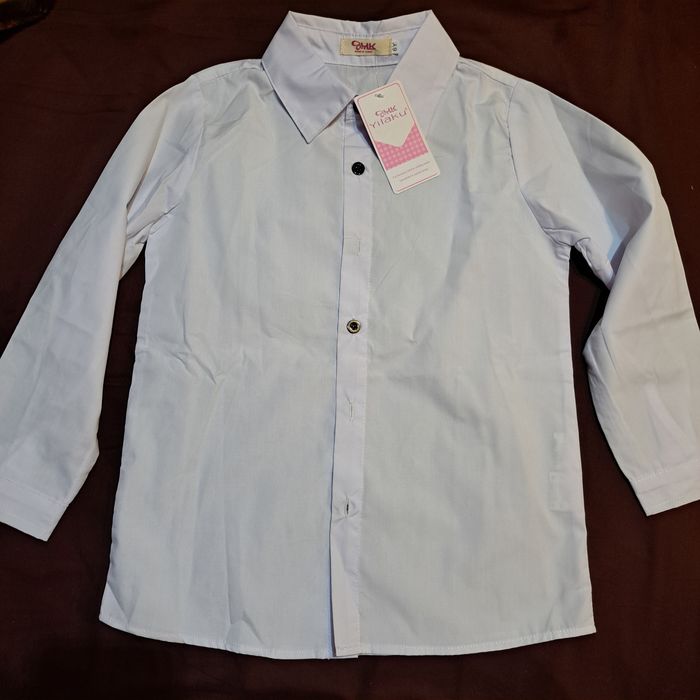 Vesta ,pantaloni și cămașa