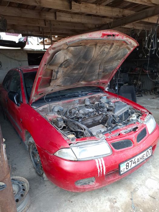 Разбираем Mitsubishi Carisma