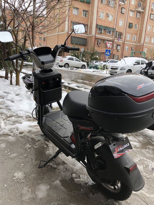 Скиллмакс скутер