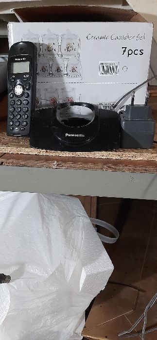 Переносной телефон