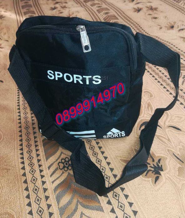 Спортна, маркова, мъжка чанта с твърди прегради и дълга дръжка