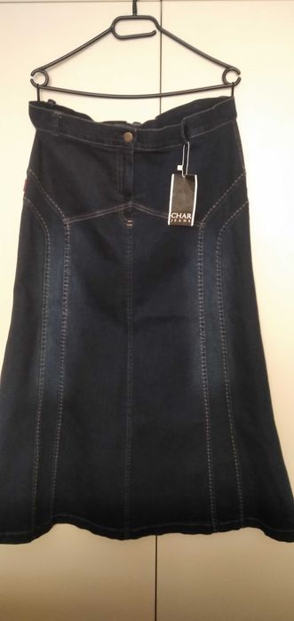 Дамска дънкова пола, тъмносин деним, украсена с кафяви тегели.