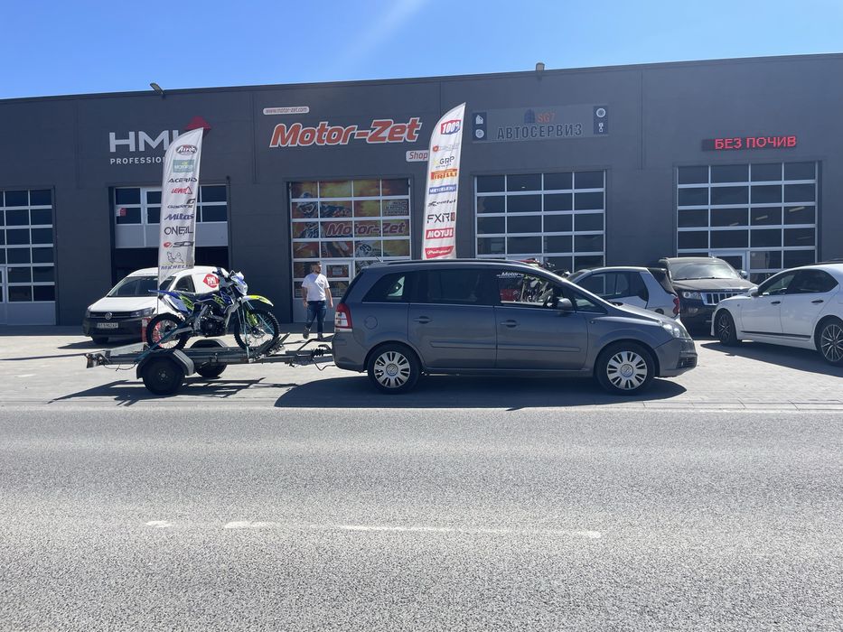 Превоз на мотори и скутери и АТВ и ремарке под наем