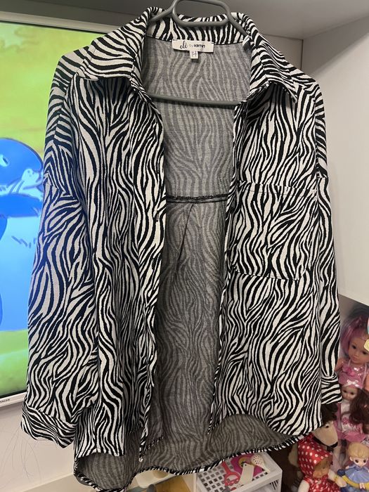 Compleu dama cu pantaloni evazati si bluza mai larga decat se vede