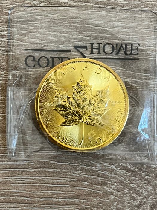 Vand aur moneda maple leaf de 31.1 gram