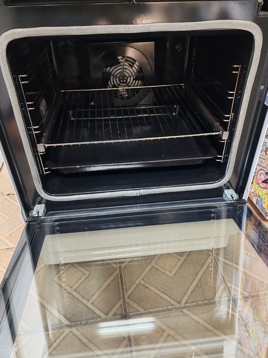 Свободно стояща печка с индукционни котлони Voss Electrolux с Pirolise и 2 години Гаранция!