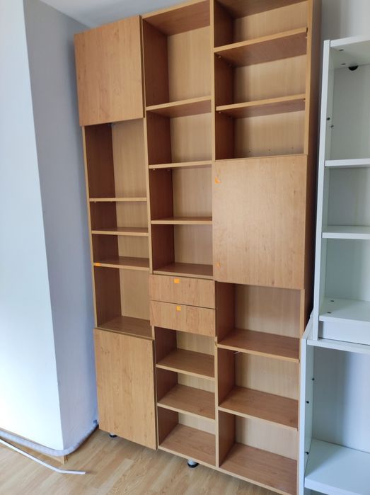 Bibliotecă înaltă cu rafturi, dulapuri și sertare  130*250cm