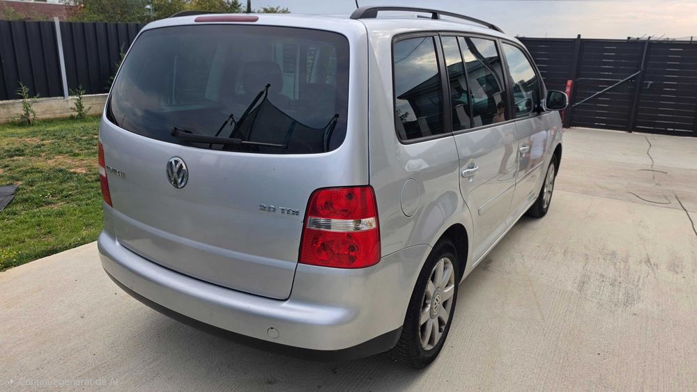 VW Touran 2.0 TDI BKD 140 CP | Unic proprietar | 5 locuri