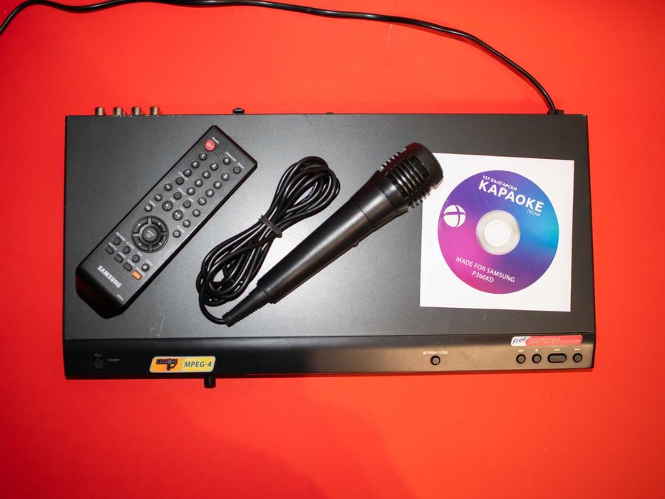 SAMSUNG караоке система DVD плейър с микрофон 150 бг песни DVD-P366KD