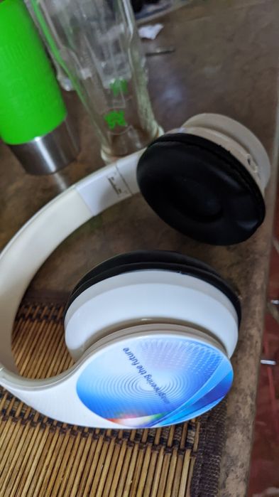 Продам новые bluetooth наушники