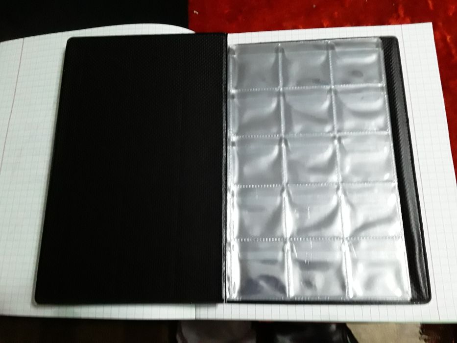 Продам альбом для монет новый