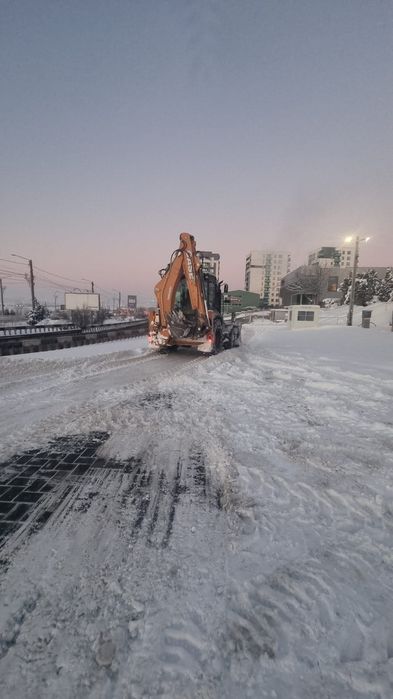 Inchiriere Buldoexcavator Iasi (deszăpezire, sapaturi, nivelare, etc)