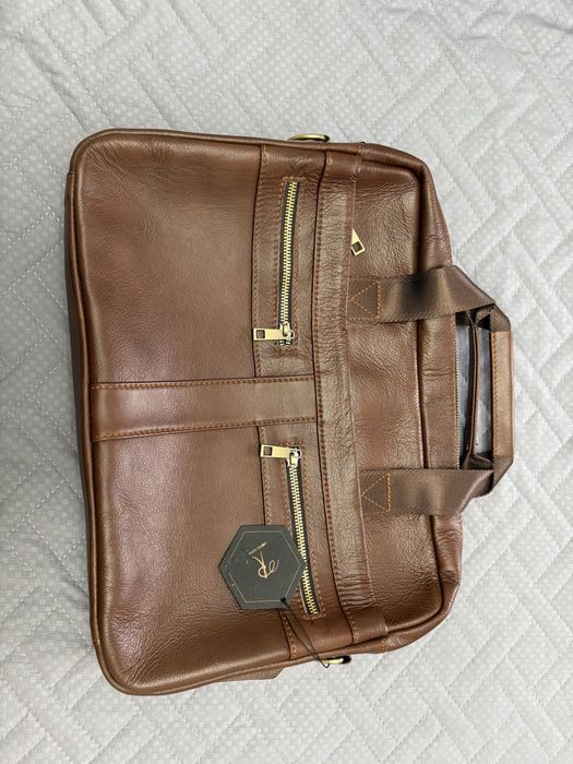 Новый кожаный портфель