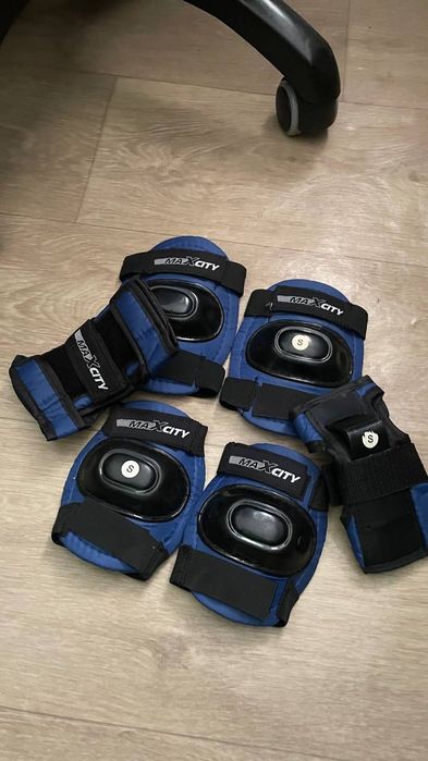 Роликовые коньки