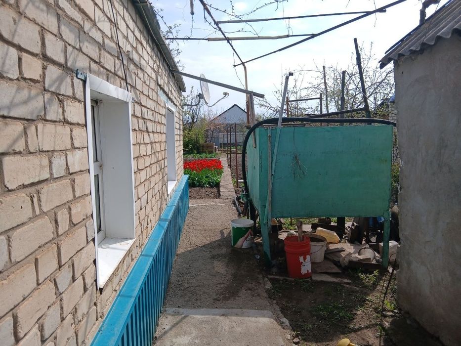 Продам дом саманный обложенный кирпичем
