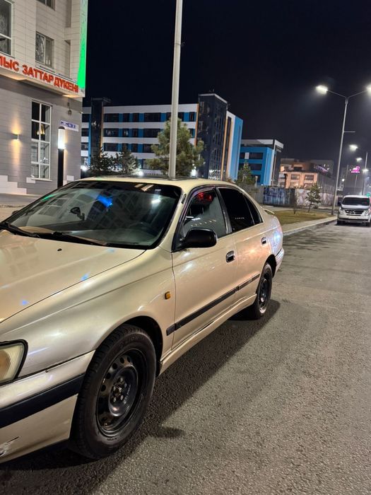Тайота карина Е 1.6