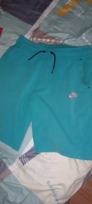 Pantaloni nike tech turcoaz