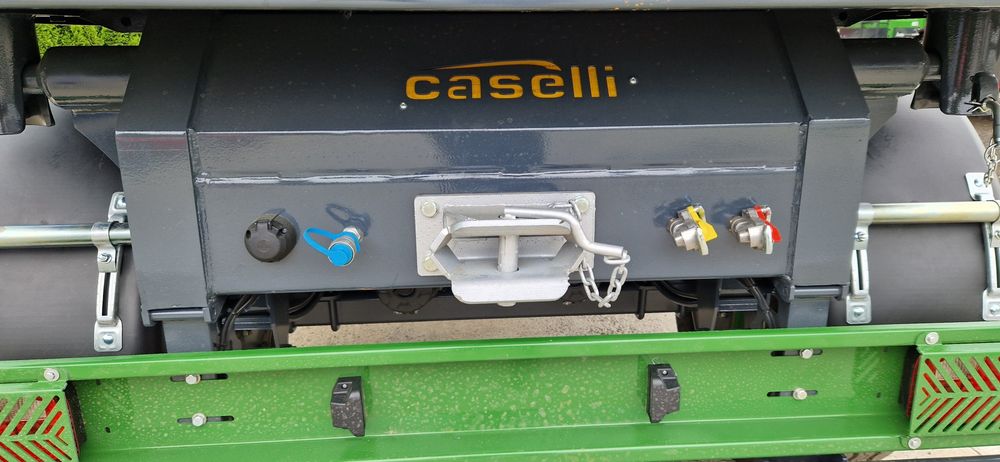 Remorca marca CASELLI dublu ax capacitate 10T, basculare trilaterala,obloane 700x400
