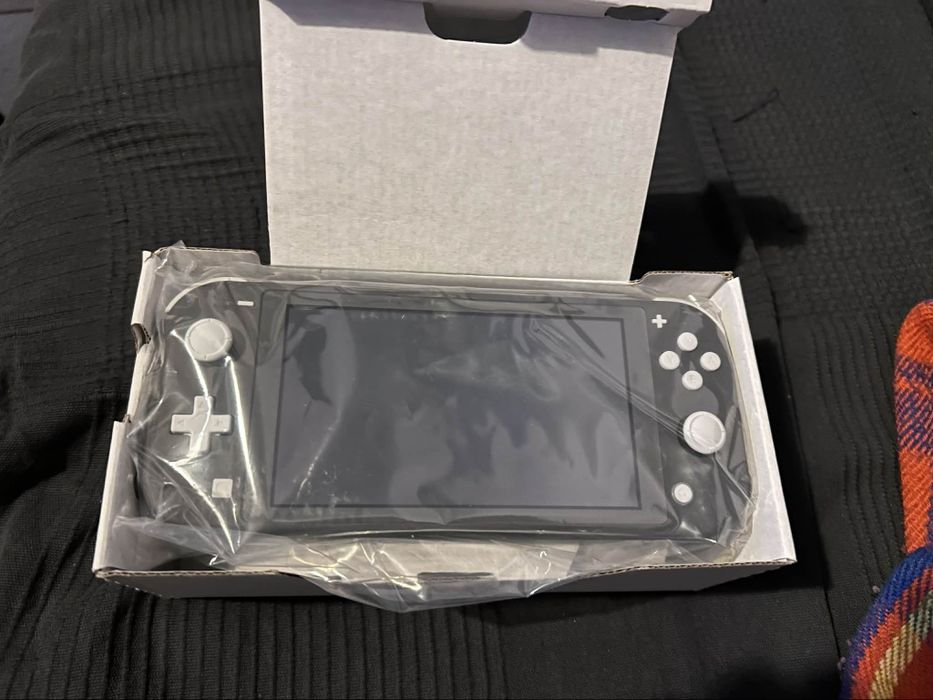 Nintendo Switch Lite нов