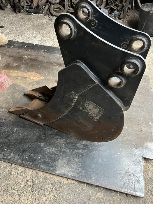 Cupa buldoexcavator komatsu graifer cu cap rotativ