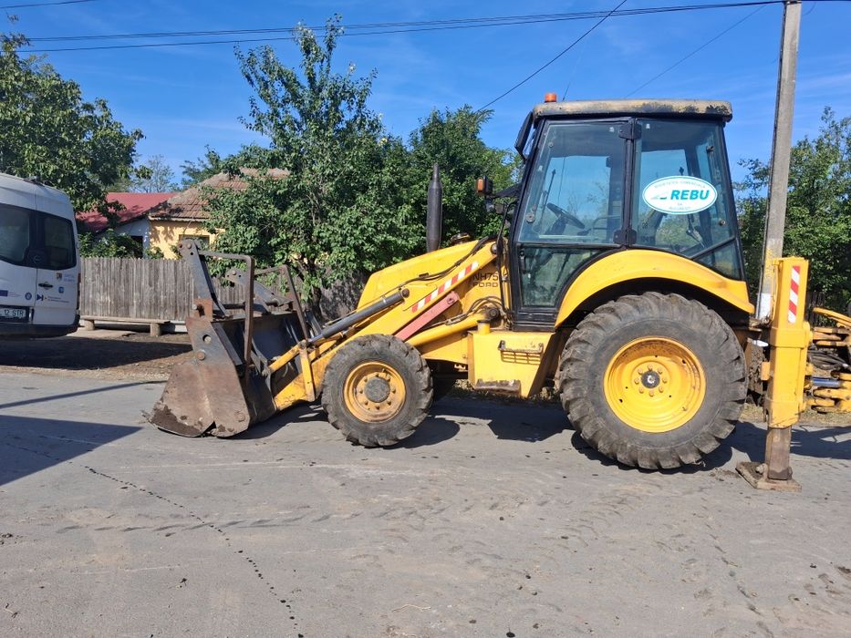 Buldoexcavator de vânzare.