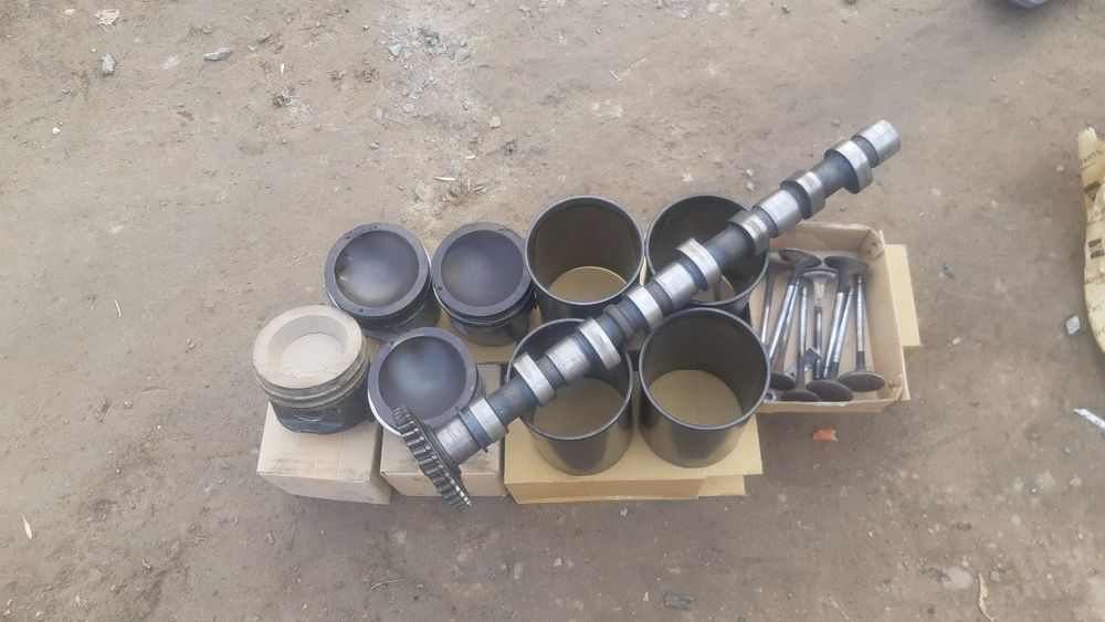 Isuzu zapchast raspiridval porshin gilza .10 tonna galovka qirishka