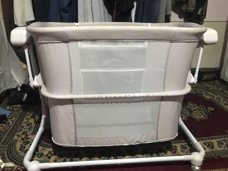 Iyulka, elektronning beshik,bolalar manej krovat.