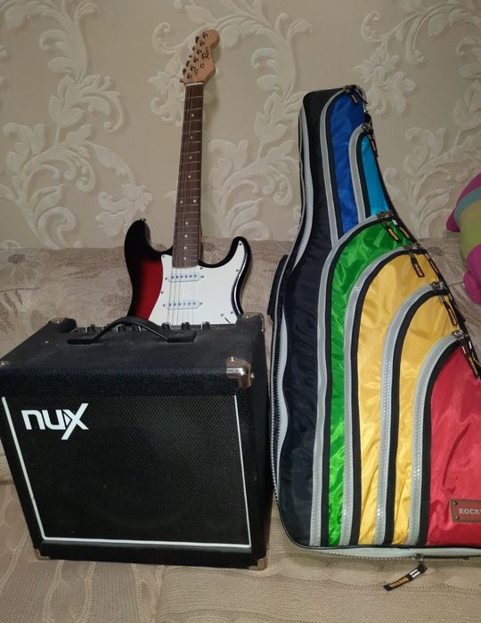 180000 тг.Гитара,комбик,чехол.