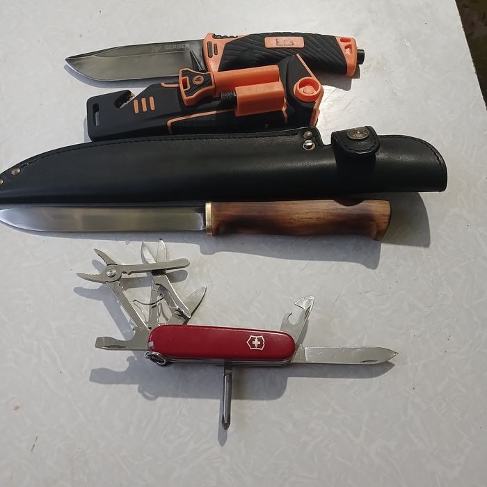 Мультитул Лезерман, викторинокс