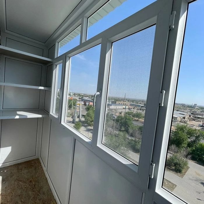 Пластиковые окна двери балконы